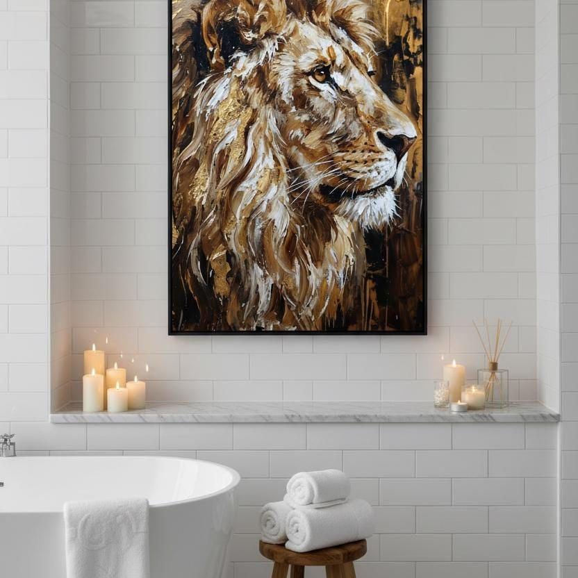 a large framed painting of a lion's head hanging on a white tiled wall above a white bathtub. The painting is surrounded by lit candles, creating a warm and inviting atmosphere.