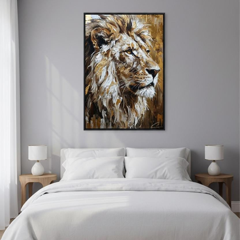 a large, framed painting of a lion's head hanging above a bed with white bedding in a bedroom setting.