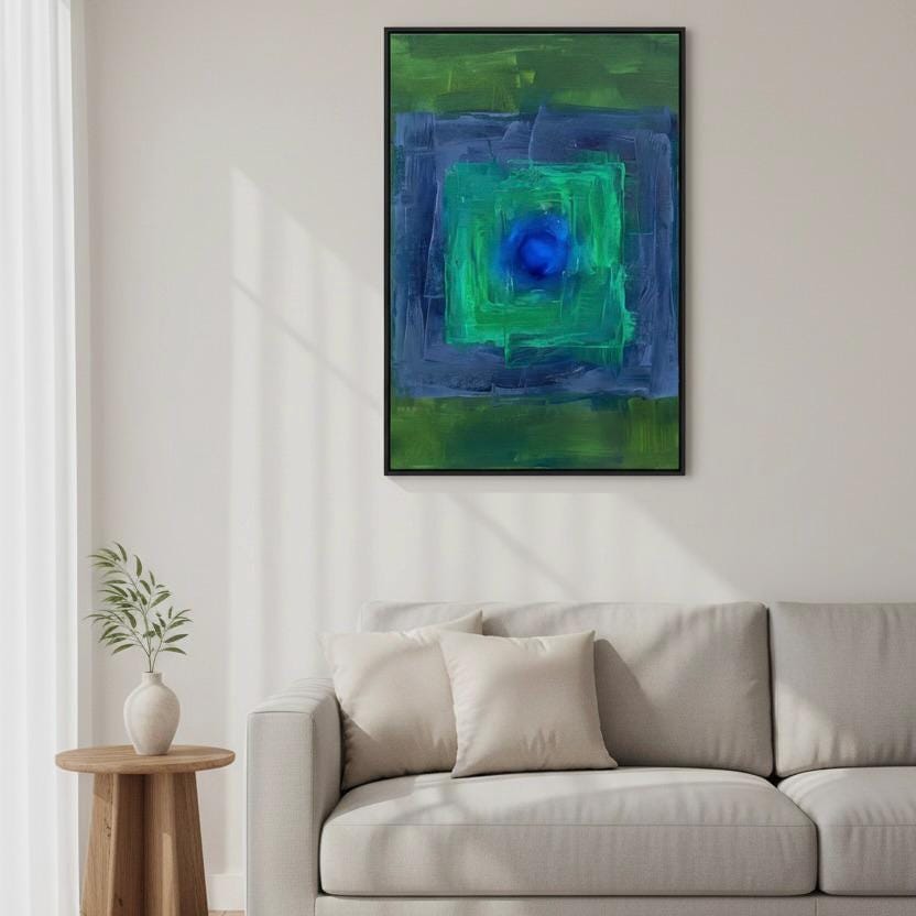 a modern living room with a gray sofa, a wooden side table, and a large abstract painting hanging on the wall above the sofa.