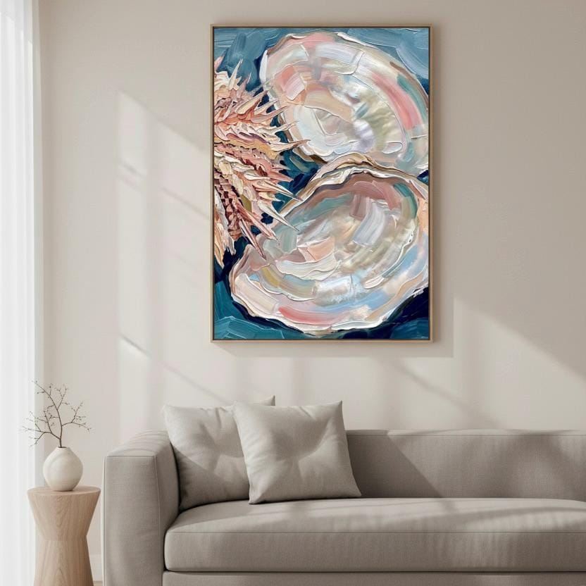 a large, colorful painting of an oyster shell hanging on a wall above a gray sofa in a living room.