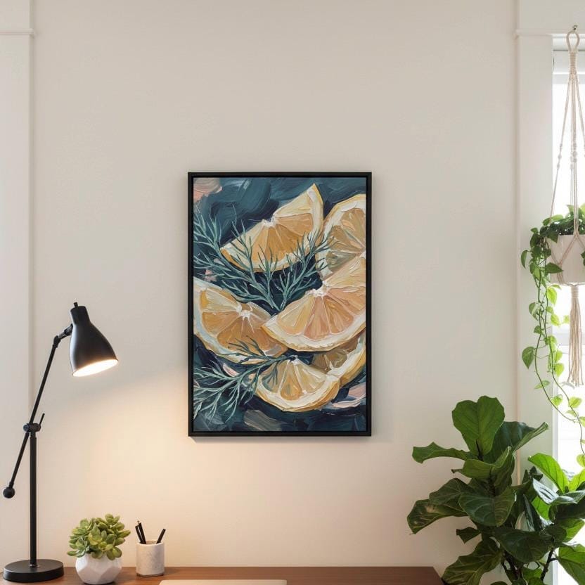 a framed painting of orange slices and greenery hanging on a wall, with a lamp, potted plant, and other decor elements in the foreground.