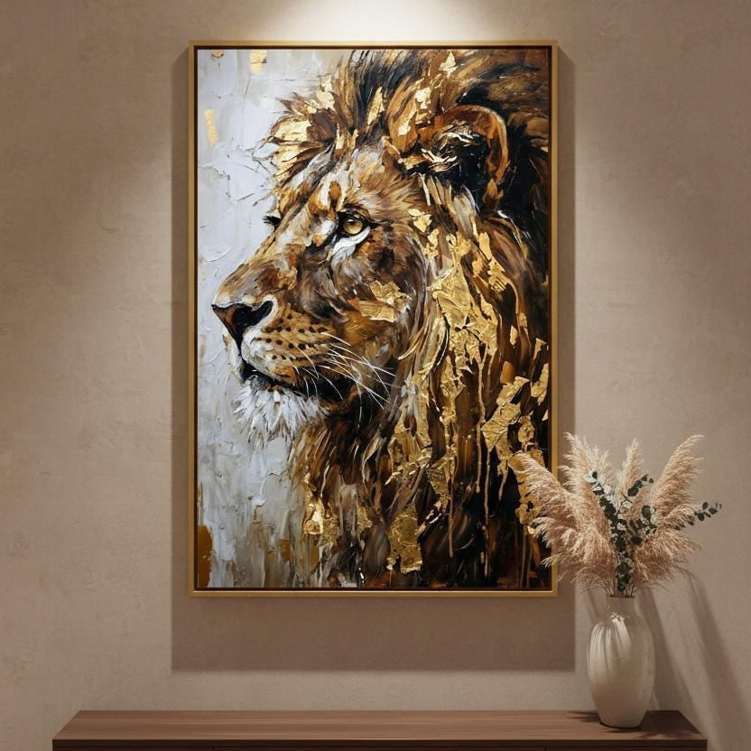 a large painting of a lion's face hanging on a wall above a wooden console table.
