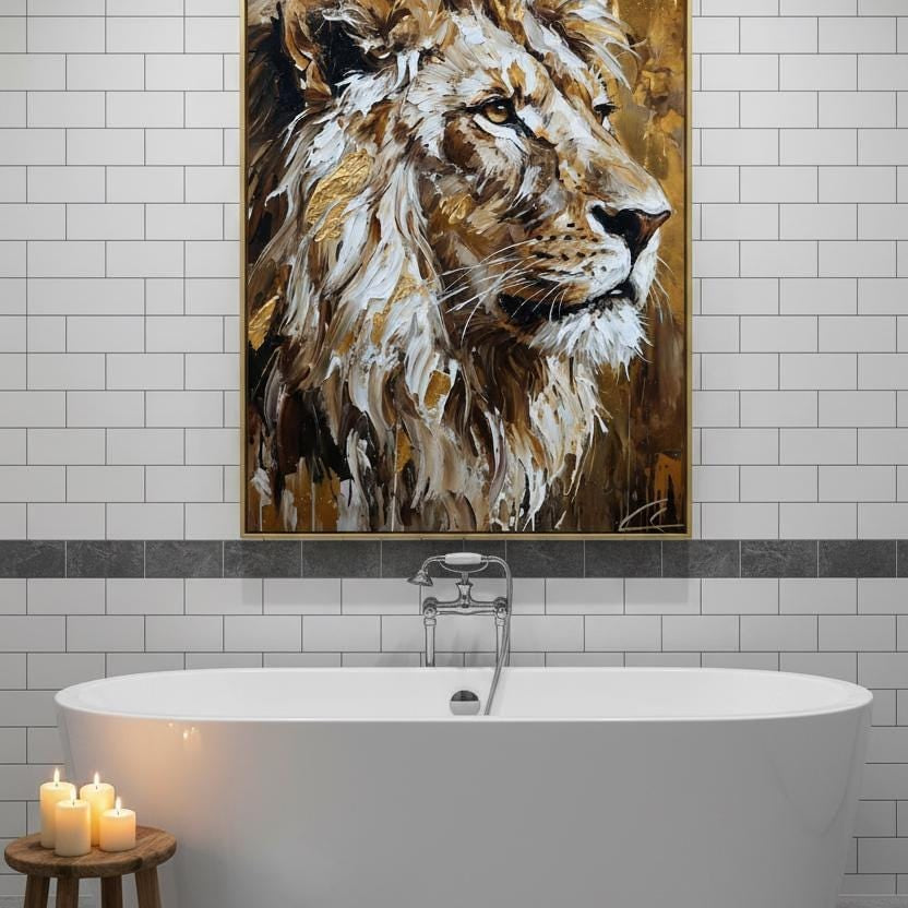 a large painting of a lion's head above a white freestanding bathtub in a bathroom setting.