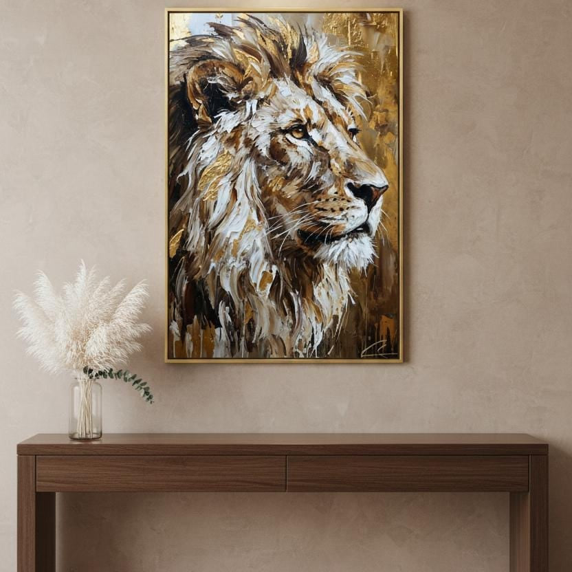 a large painting of a lion's head hanging on a wall above a wooden console table.
