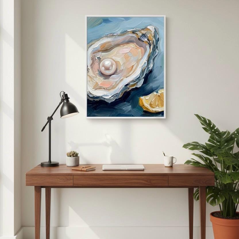 a wooden desk with a laptop, a lamp, and a plant, set against a white wall with a framed painting of an oyster shell and a pearl hanging above it.